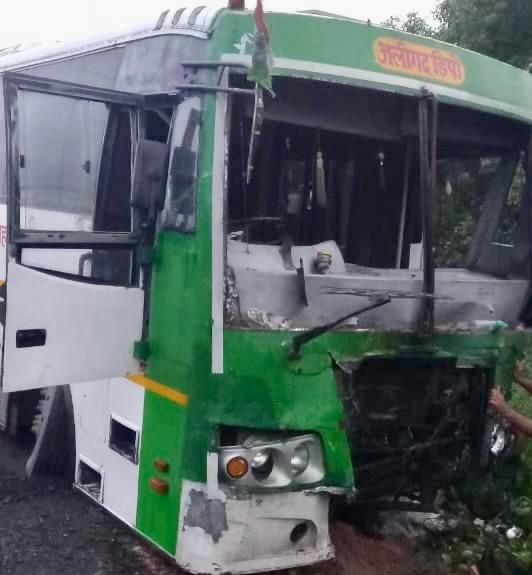 Accident occurred when the bus (in picture) tried to overtake the van